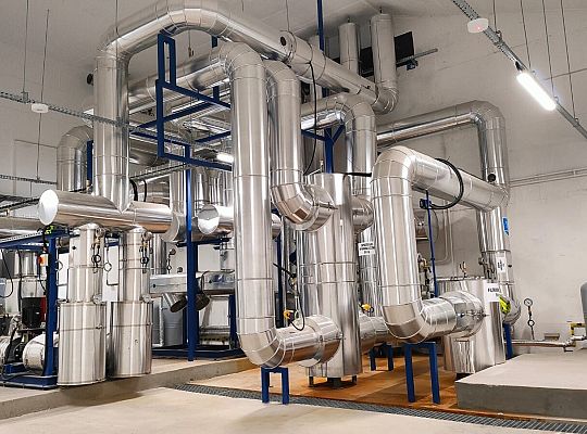 Kogeneracja 2,2MW wyprowadzenie mocy cieplnej  na potrzeby procesu suszenia.